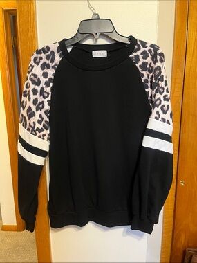 Back Home Boutique Black Sweatshirt with Leopard Raglan Sleeves